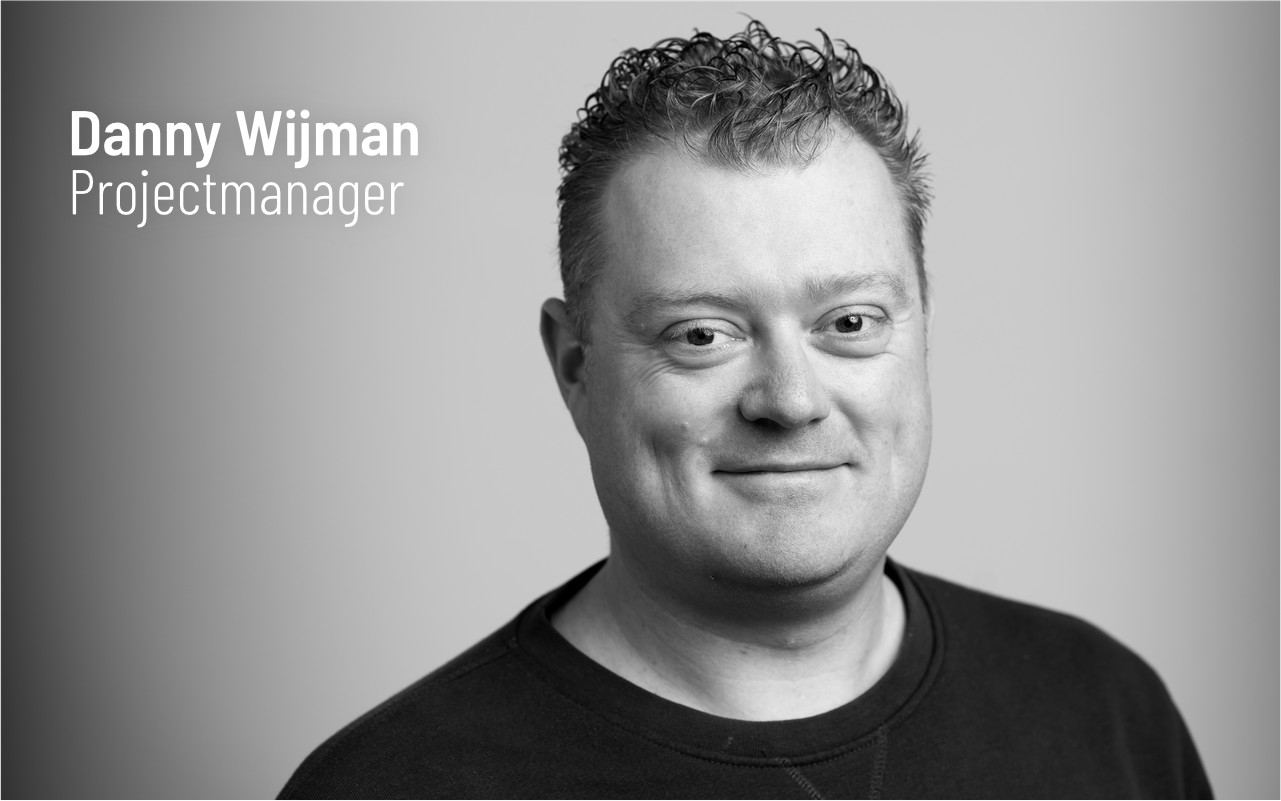 Portretfoto met daaroverheen de tekst: ‘Danny Wijman, Projectmanager’